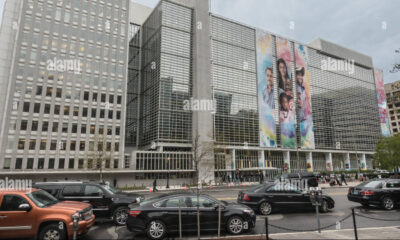 world bank headquarters building washington dc with colorful banners during annual spring meetings with the imf pennsylvania avenue and 18th st MMEHW7